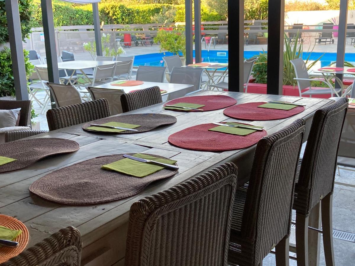 Logis Restaurant Les Aubuns Hotel Caissargues