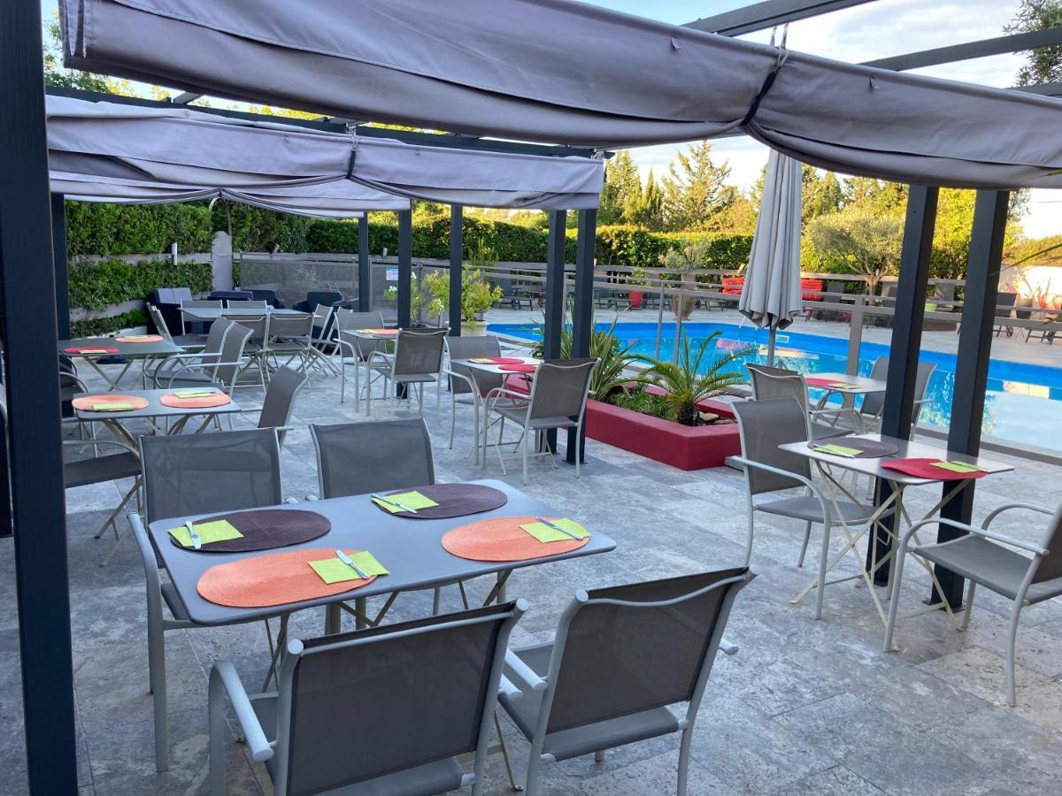 Logis Restaurant Les Aubuns Hotel Caissargues